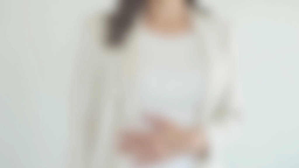 Person demonstrating proper posture and breathing technique with hands positioned at diaphragm